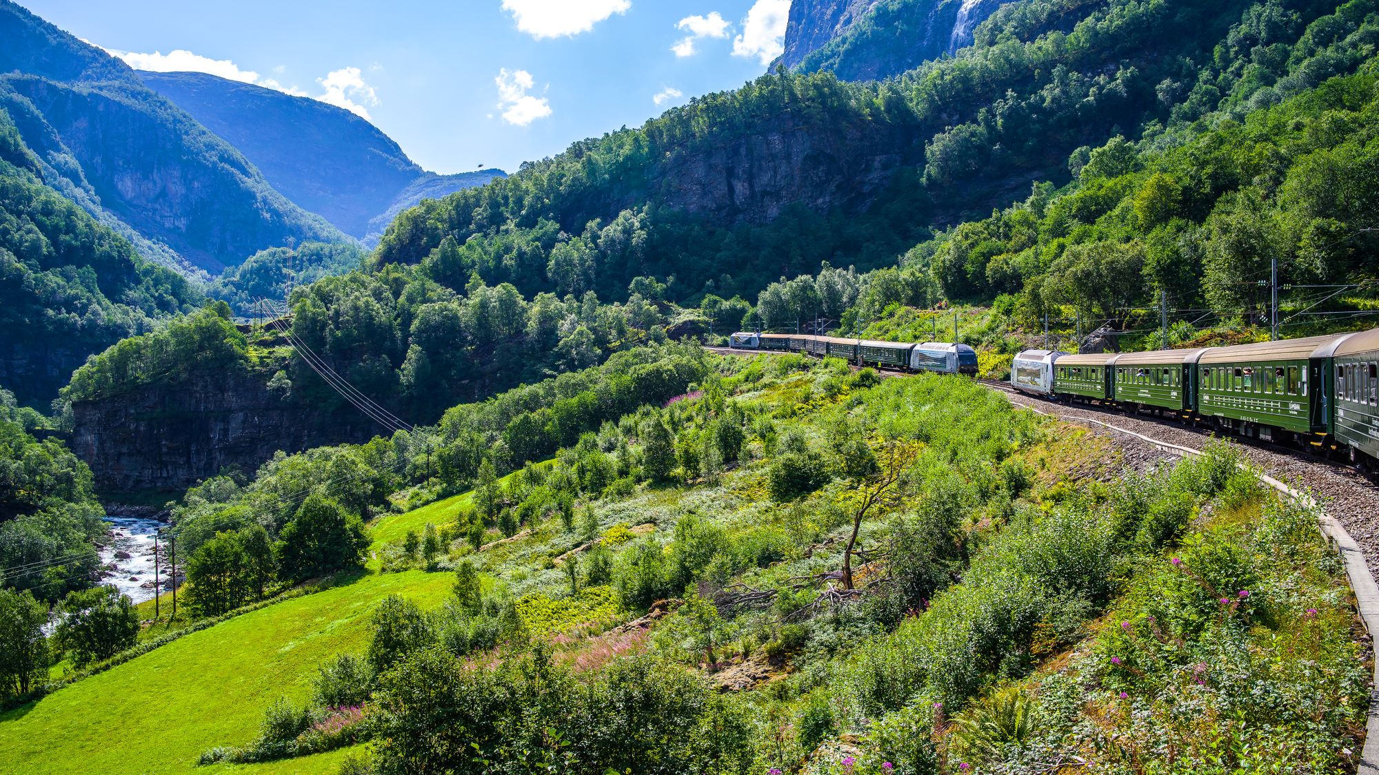 a train going through mountains