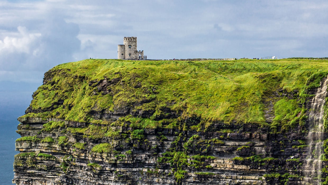 Cliffs of Moher with small castle