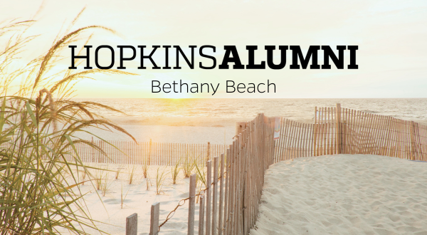 Beach Scene with Hopkins Alumni Banner