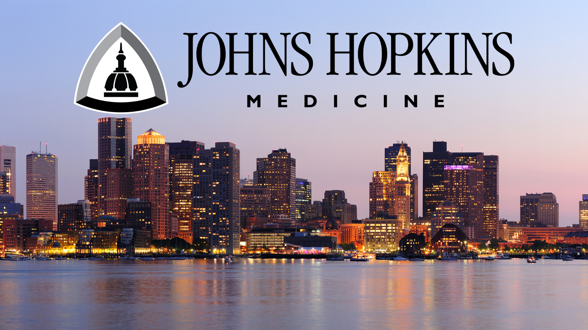 Boston skyline with Johns Hopkins Medicine logo