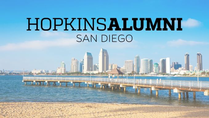 San Diego skyline with Hopkins Alumni banner